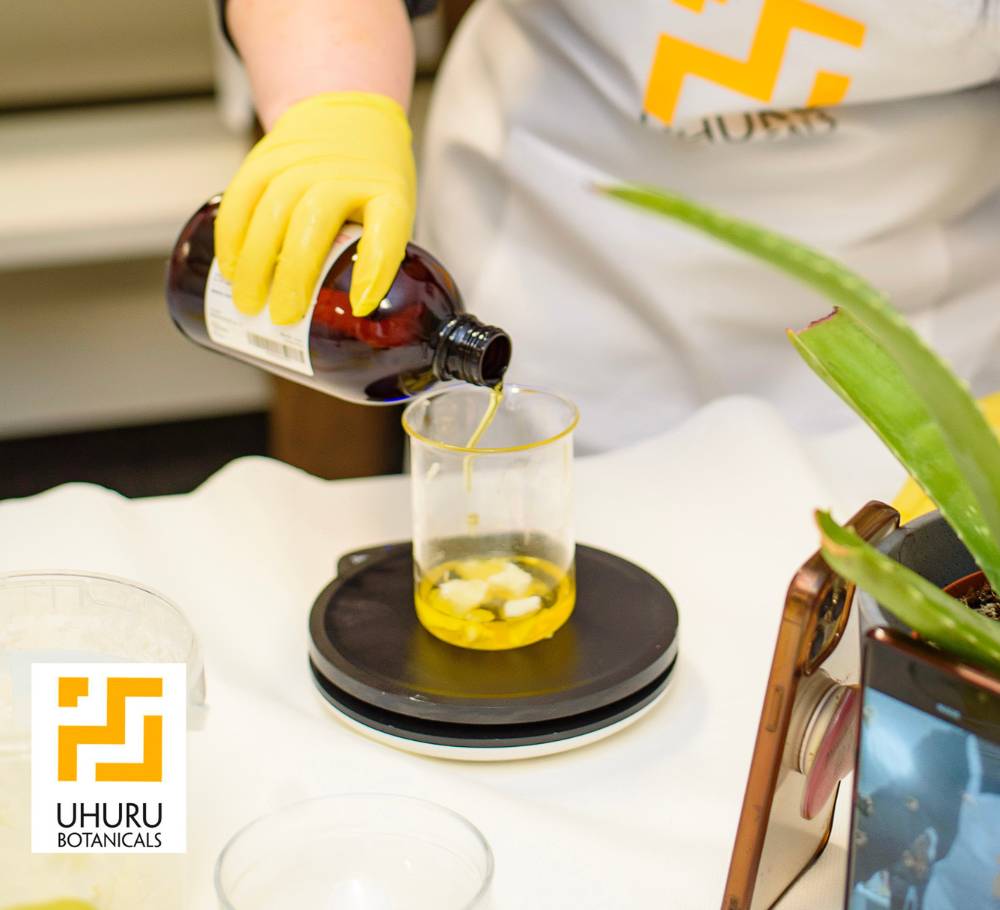 Cosmetic Formulation Academy student measuring ingredients.
